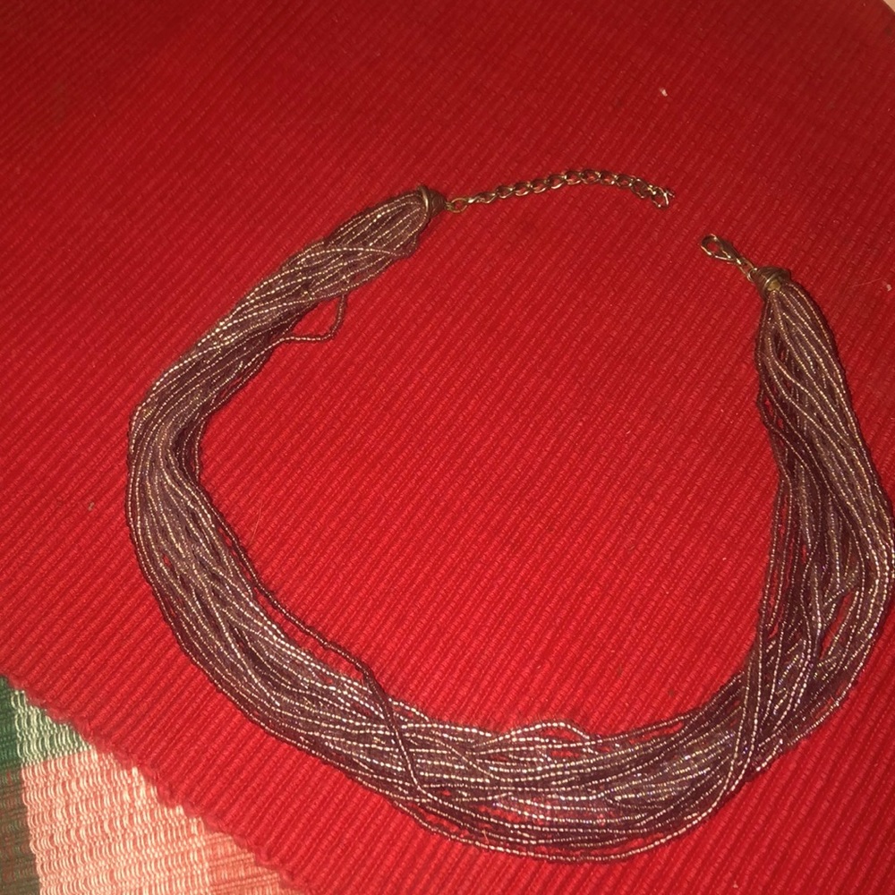Vintage boho looking purple multi strand seed bead necklace